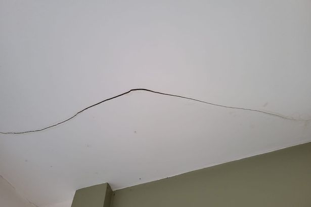 North Belfast woman's frustration as 'home unsafe to live in' due to cracking walls and damp