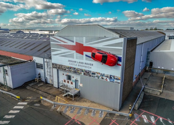 BIRMINGHAM, UNITED KINGDOM - SEPTEMBER 30: An aerial view of JLR signage at the Jaguar Land Rover vehicle manufacturing plant in Castle Bromwich on September 30, 2025 in Birmingham, United Kingdom.