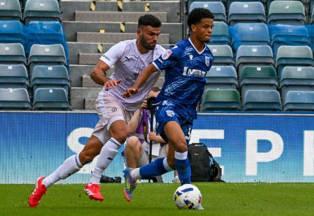 Gillingham boss Gareth Ainsworth has said he will make changes to his squad for the League Two trip to Barrow but who comes in?