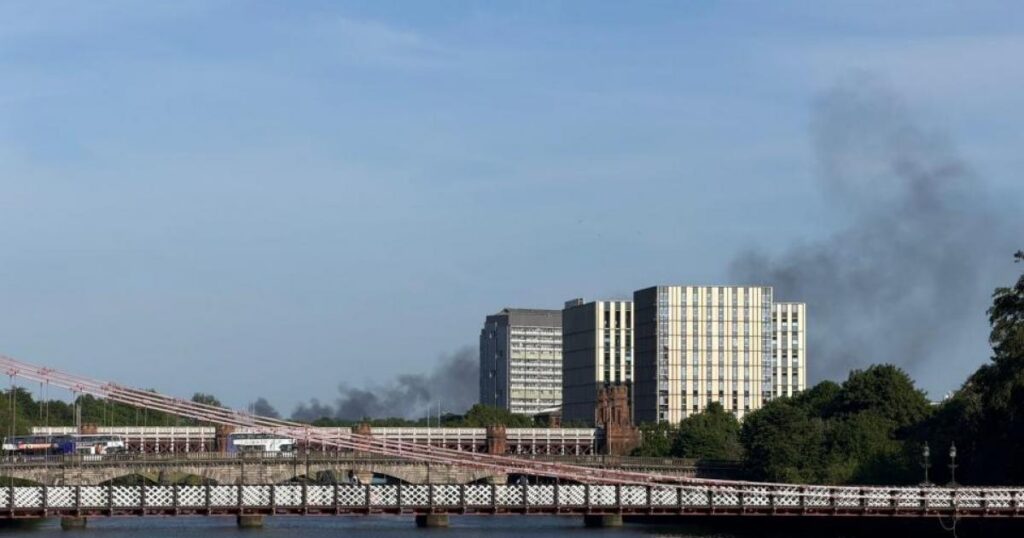 Large fire sends plumes of smoke across Glasgow as fire crews tackle blaze