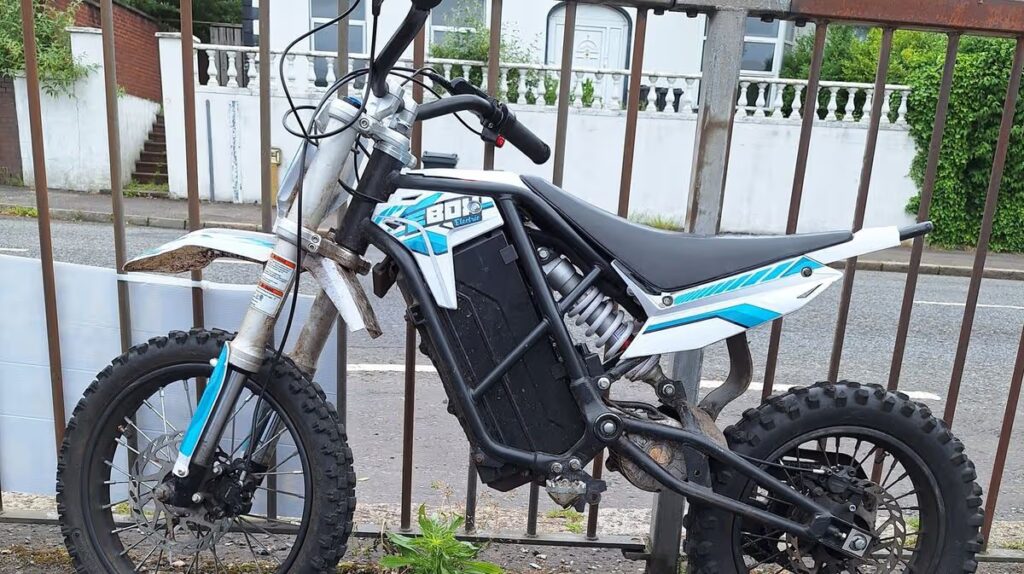 Youths stopped by police after doing wheelies in middle of North Belfast road