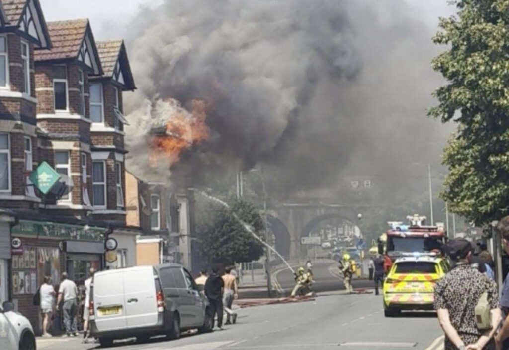 Dover Road in Folkestone closed as fire crews tackle huge blaze at top-floor flat